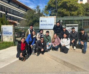 Group of interns in Chile posing for a group photo outdoors.