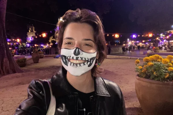 Intern in Oaxaca during Dia De Los Muertos with face makeup