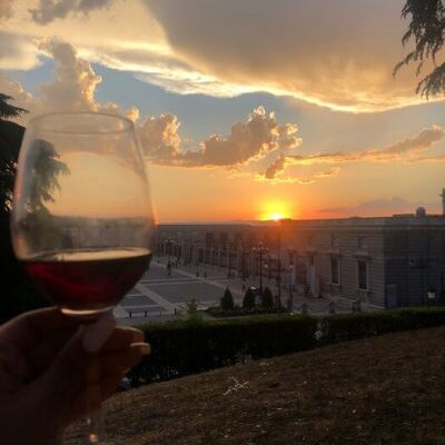 study-abroad-student-enjoying-a-glass-of-wine-during-Madrid-sunset-in-Spain-1-p9vovkuuj5y5v886ekrc8j9vfg032opzm0x33q2nde enjoying a glass of wine during Madrid sunset