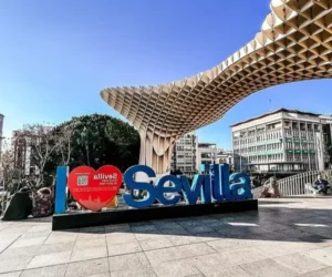 I Love Sevilla sign in front of the Metropol Parasol landmark in Seville, Spain