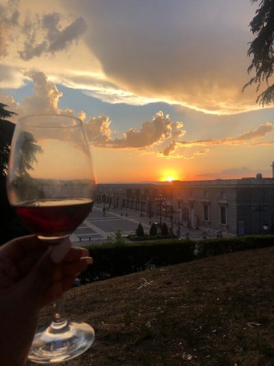 enjoying a glass of wine during Madrid sunset